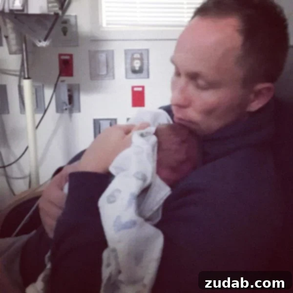 The Shadowed Path: Faith's Unwavering Fight Part 27 4 A photo fo Cade holding our little baby boy.