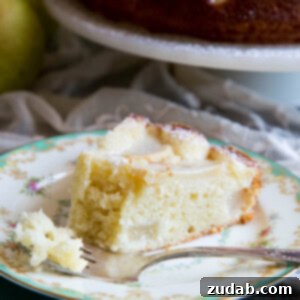 A slice of pear cake on a plate