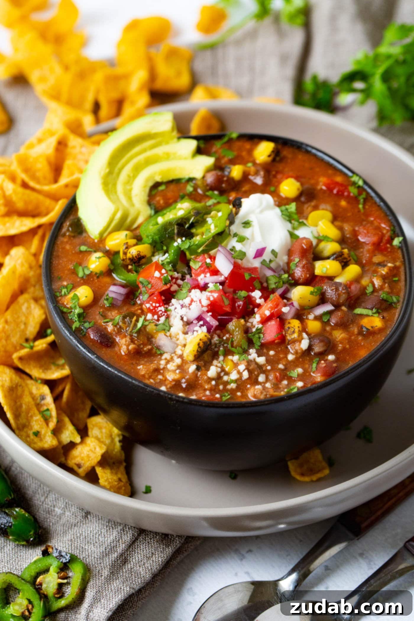 Easy Instant Pot Taco Ground Beef Chili 3 Another enticing view of the Taco Ground Beef Instant Pot Chili, highlighting the generous toppings and rich texture.
