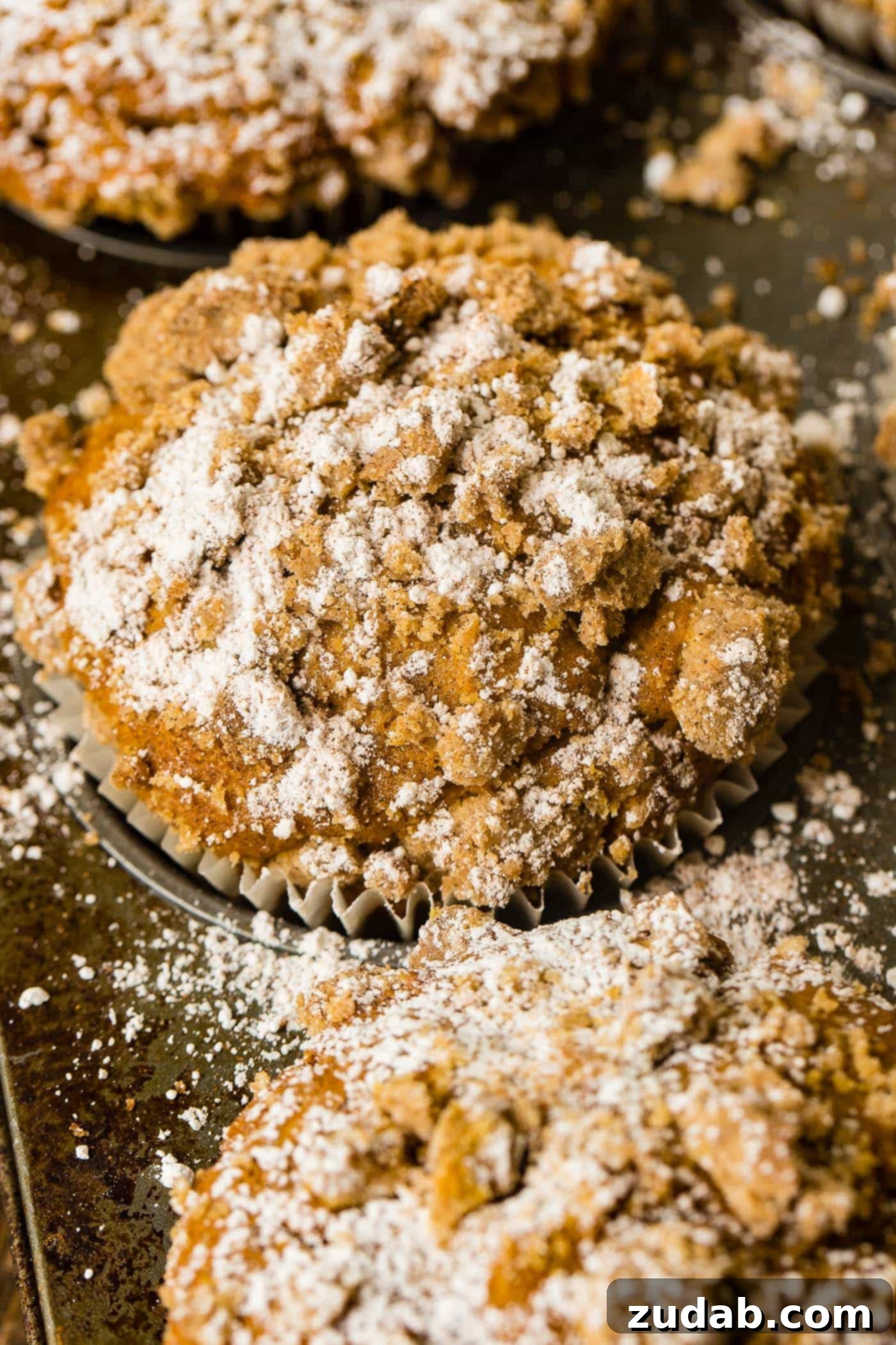 Irresistible Costco Style Pumpkin Streusel Muffins 6 An overhead shot showcasing a batch of freshly baked jumbo pumpkin streusel muffins.