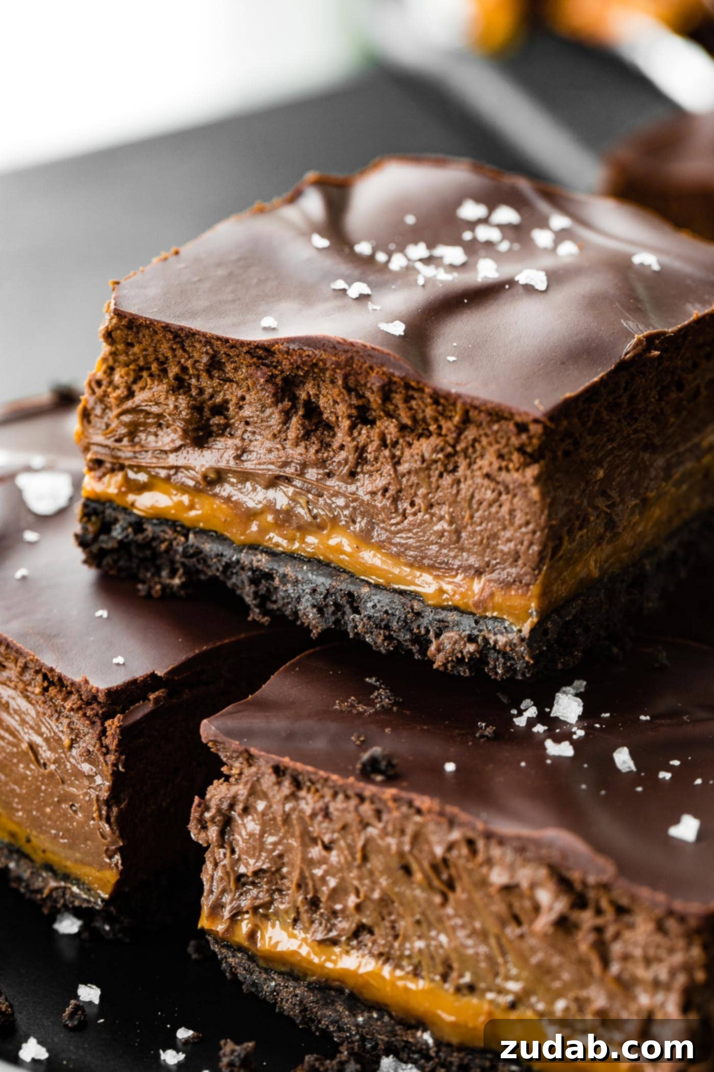 Decadent Dulce de Leche Chocolate Cheesecake Squares 4 3 dessert bars with creamy rich chocolate, decadent caramel, and an oreo crust