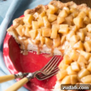 Apple cream pie with a few slices taken out
