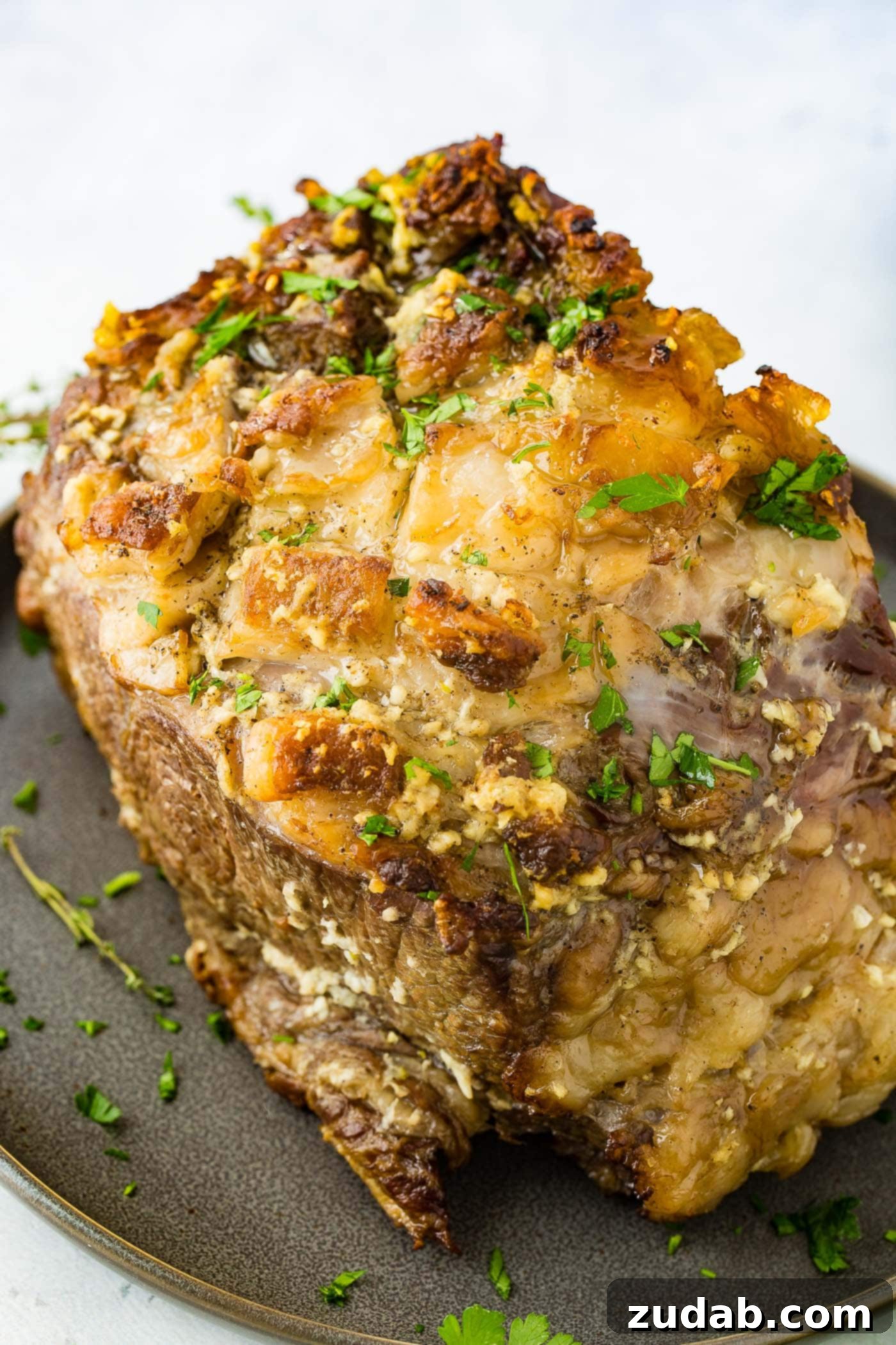 Instant Pot Prime Rib A perfectly cooked Instant Pot Prime Rib roast, ready for slicing, showing off its golden-brown crust.