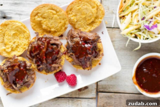 Driscoll's Raspberry BBQ Sliders with tender, juicy shredded beef served on delicious Alexia Sweet Potato Rolls Driscoll's Raspberry BBQ Sliders with tender, juicy shredded beef served on delicious Alexia Sweet Potato Rolls