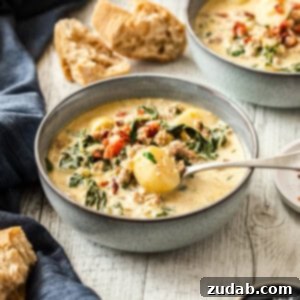 One-Pot Zuppa Toscana soup in a bowl with bread