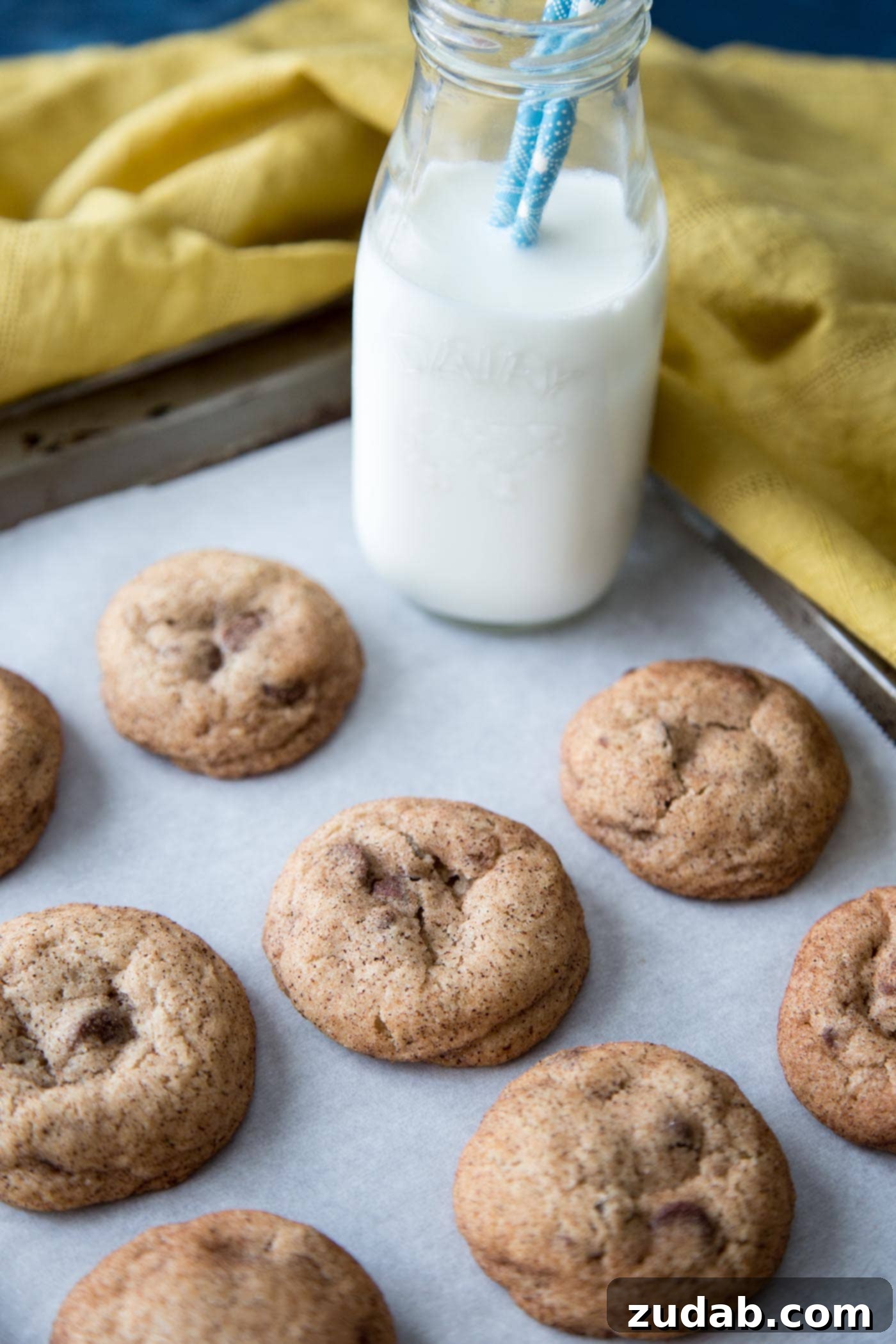 Ultimate Chocolate Chip Snickerdoodles 5 Cookies on a baking tray