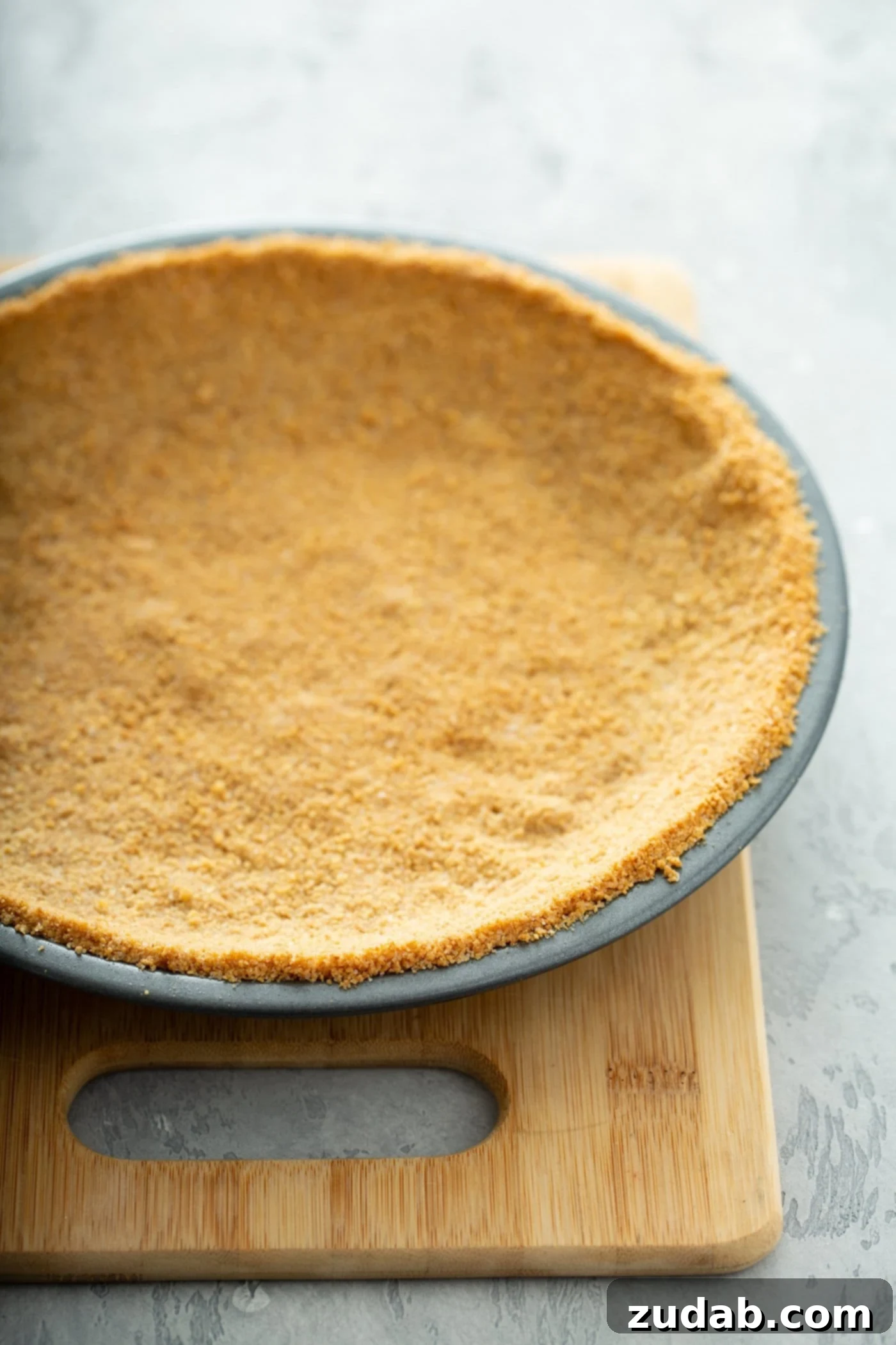 White Chocolate Berry Icebox Pie 6 A graham cracker crust in a pie pan.