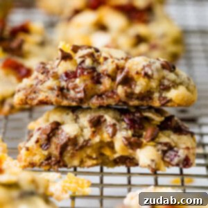 A delicious Craisin Frosted Flake Chocolate Chip Cookie, showcasing its unique blend of textures and flavors.