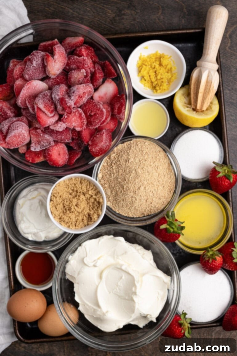 Luscious Strawberry Cheesecake Minis 3 Ingredients laid out on a cookie sheet for a creamy berry dessert with a honey cookie crust.