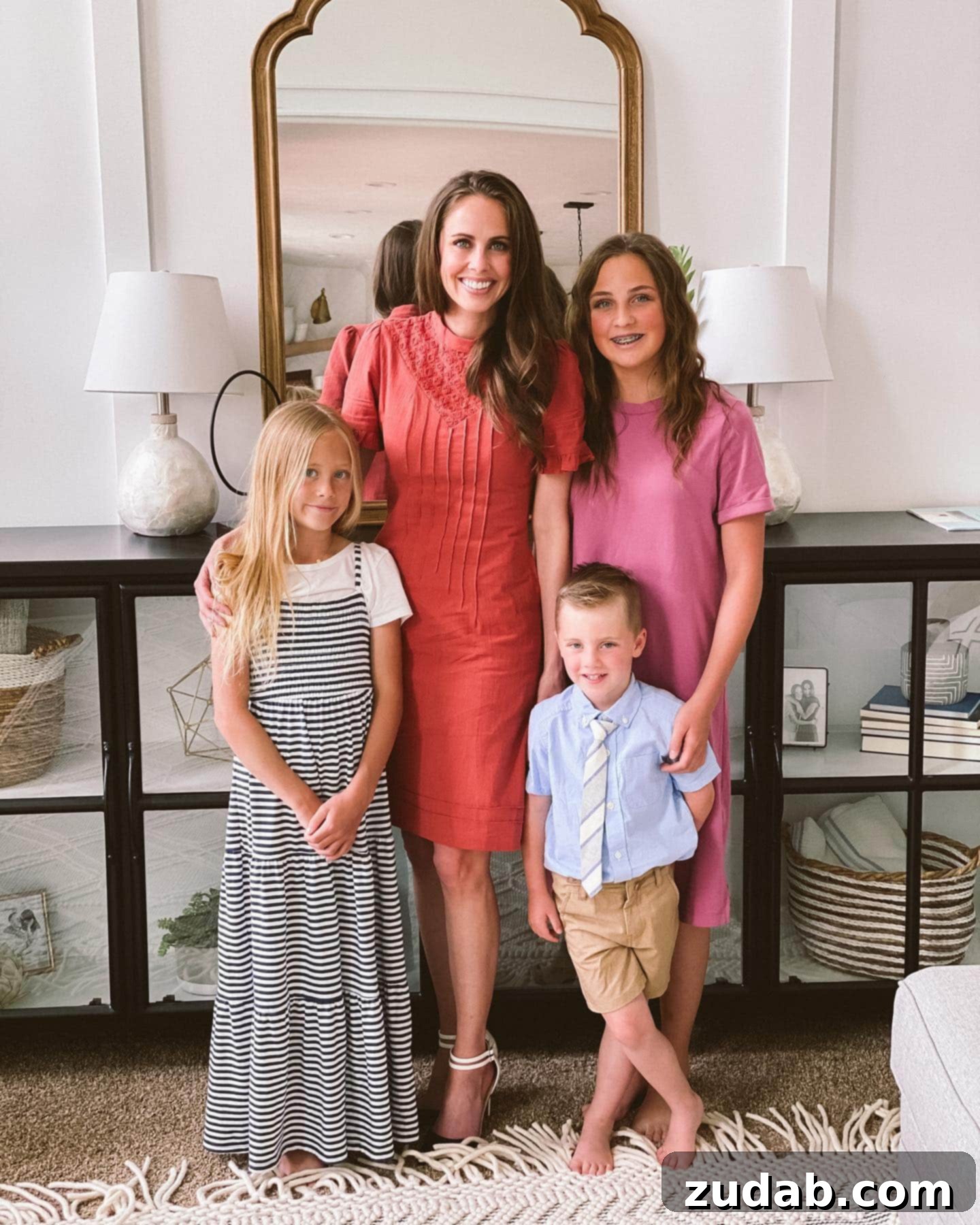 Hearing Him in a New Way: Adapting to Spiritual Change A mother and her three children, dressed in Sunday attire, are shown in a warm, family portrait, symbolizing spiritual guidance and family unity.