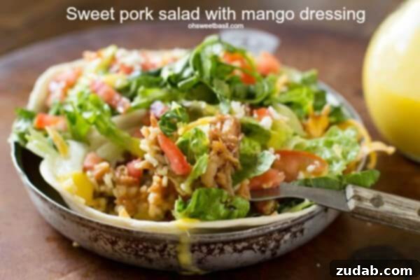 Sweet Pork salads stuffed with cilantro lime rice, beans and a killer mango dressing. ohsweetbasil.com