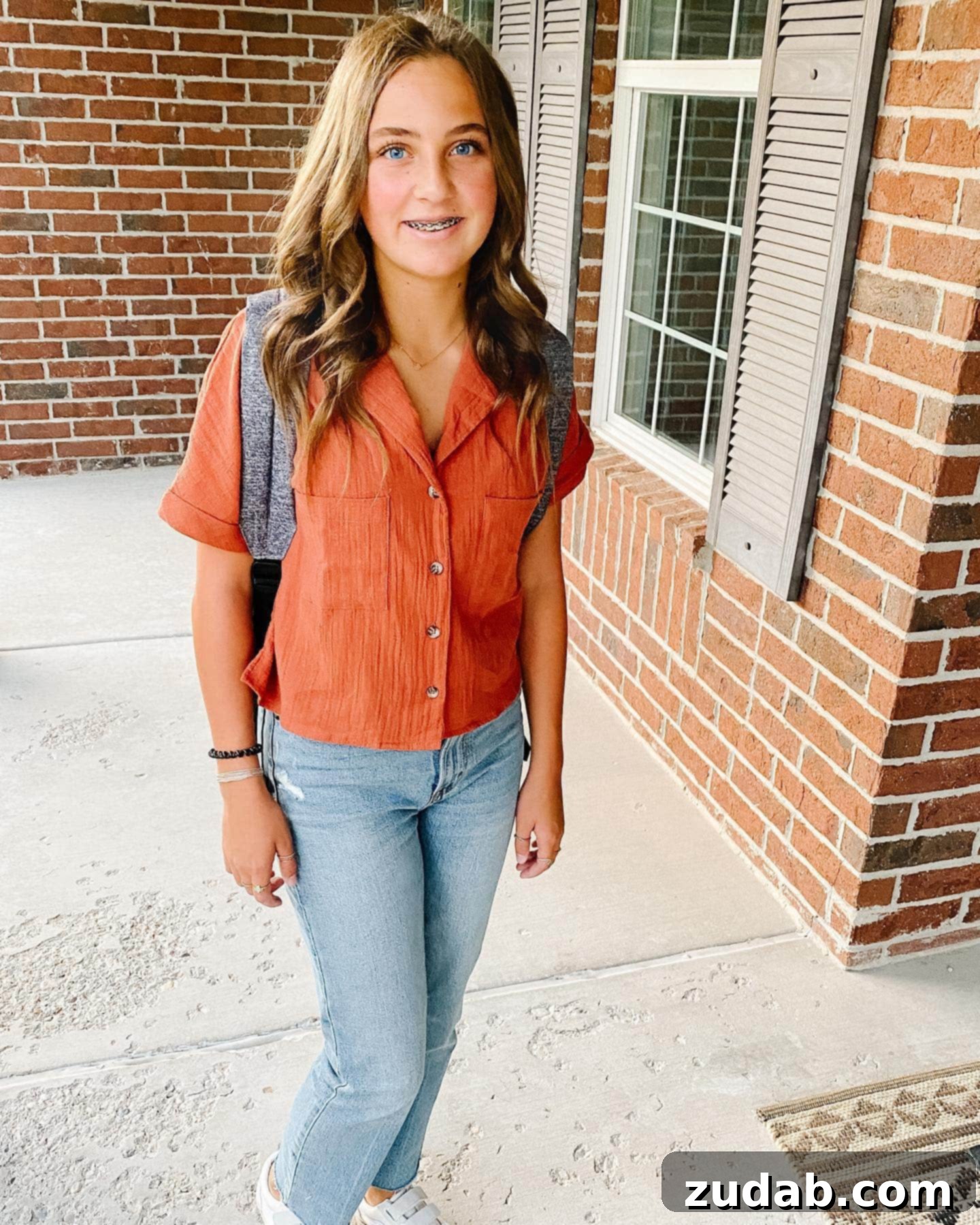 It Will Change Them a photo of a young beautiful girl with a backpack on ready for her first day of high school