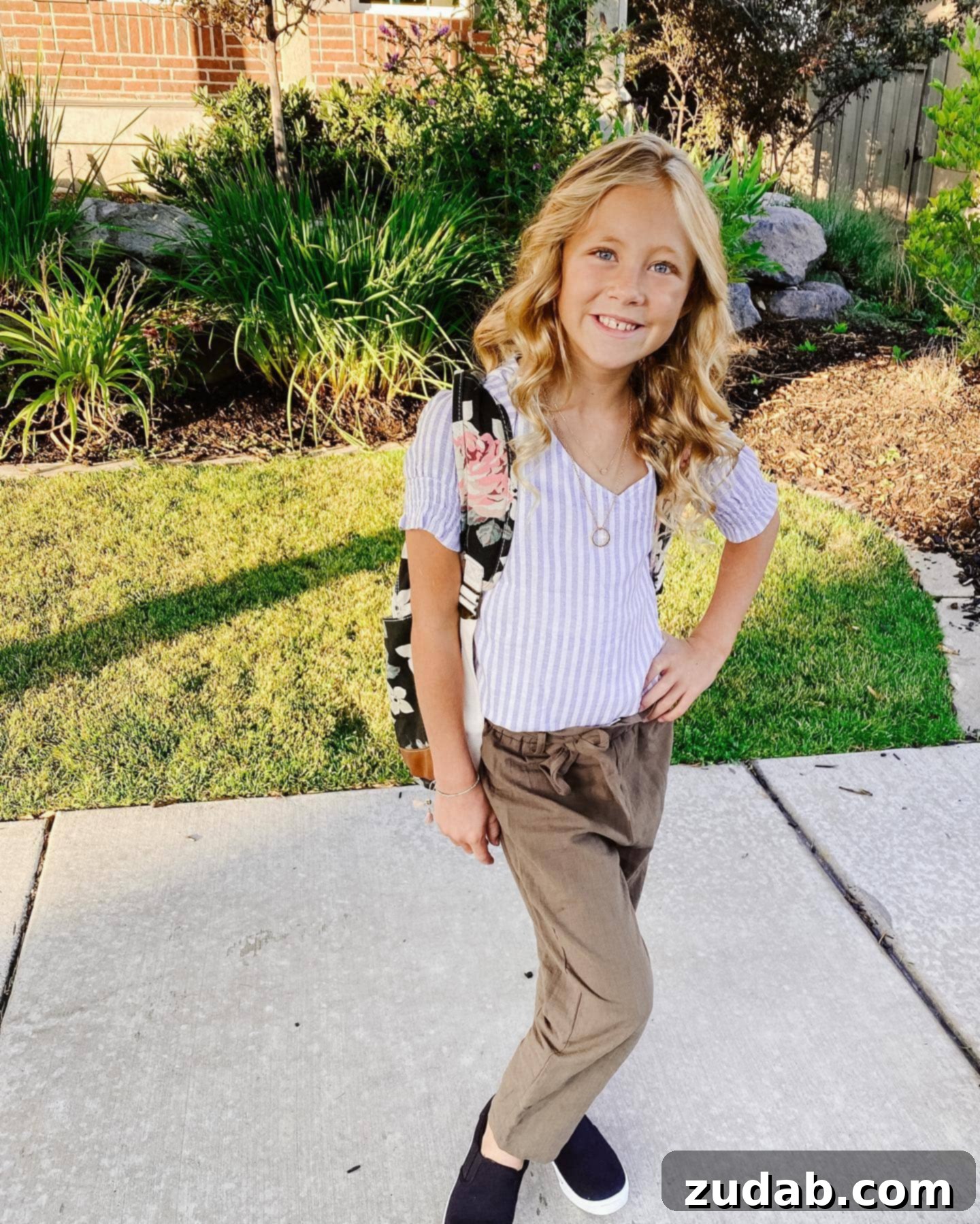 It Will Change Them a photo of a young girl with a backpack on ready for her first day of 5th grade