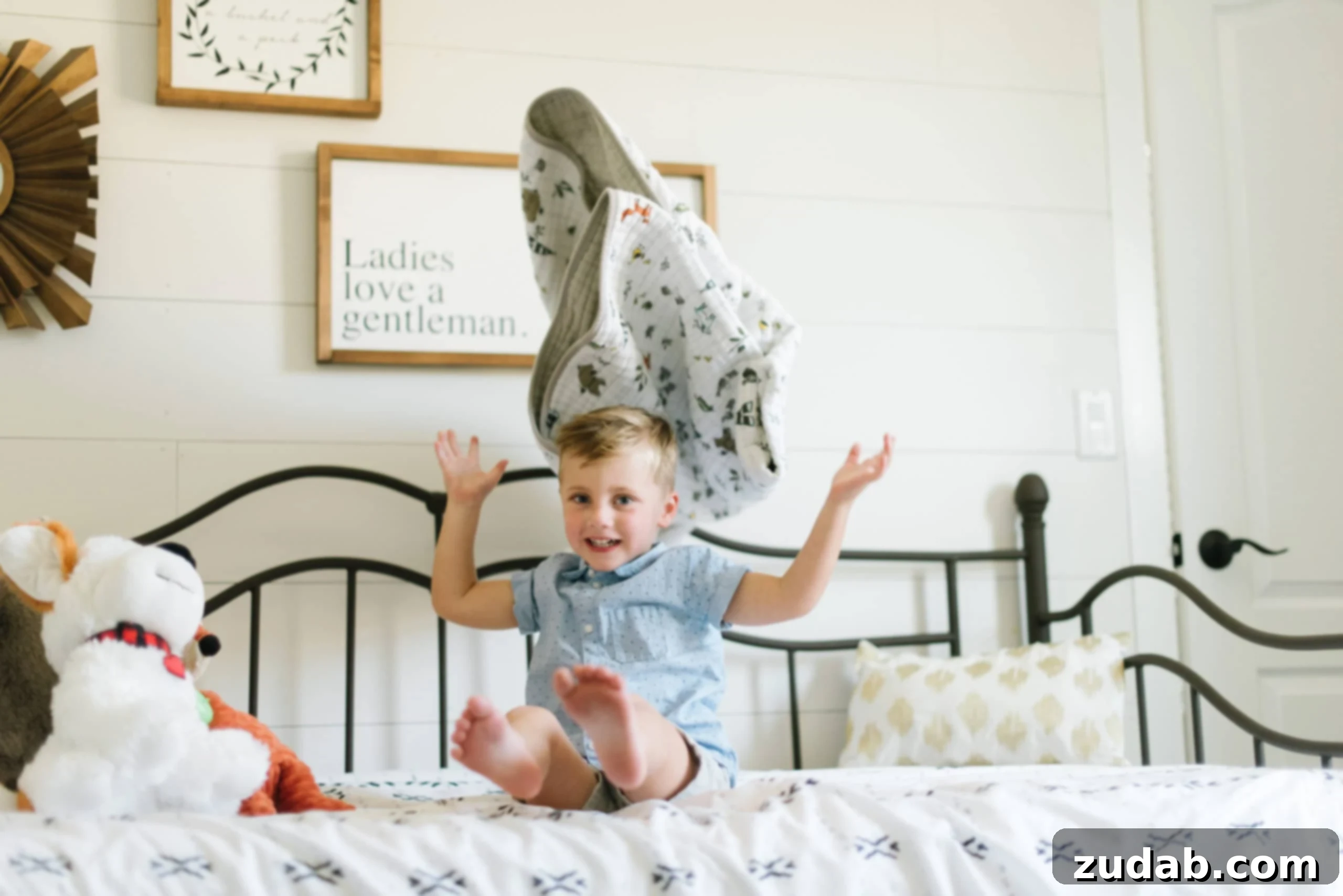 Cultivating Gratitude: The Power of 'I See You' a photo of a young boy sitting on his bed throwing his blanket up in the air, depicting joy and innocence