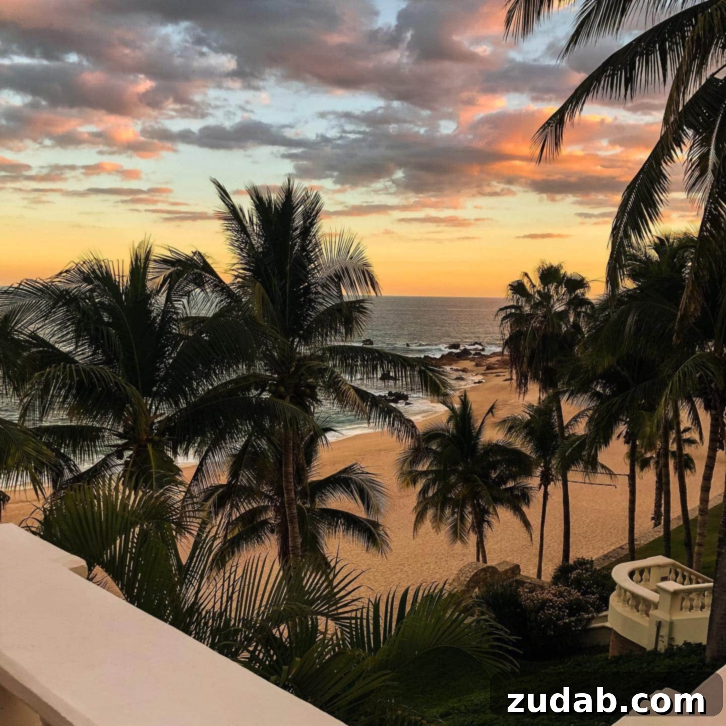 A stunning sunset over a body of water, with vibrant orange and purple hues reflecting on the surface.
