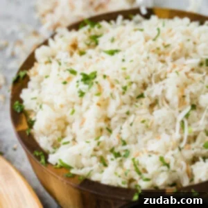A photo of Brazilian coconut rice with toasted edges.