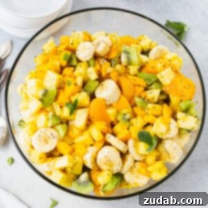 Island Fruit Medley 2 A square thumbnail image of the vibrant Tropical Fruit Salad with Honey Lime Poppy Seed Dressing.