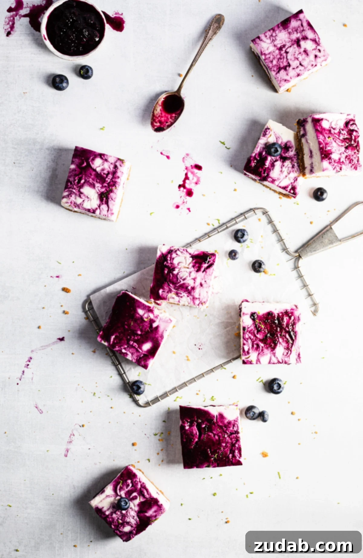 Luscious No-Bake Blueberry Lime Cheesecake Bars 3 Close-up of no-bake blueberry lime cheesecake bars with blueberry swirl