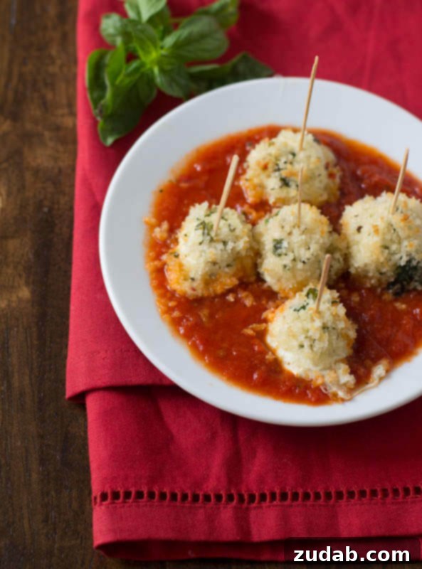 Baked Mozzarella Bites: Your New Favorite Freezer Snack Deliciously baked golden mozzarella bites, perfect for a healthy and easy snack or appetizer. Keep them in your freezer for instant gratification.