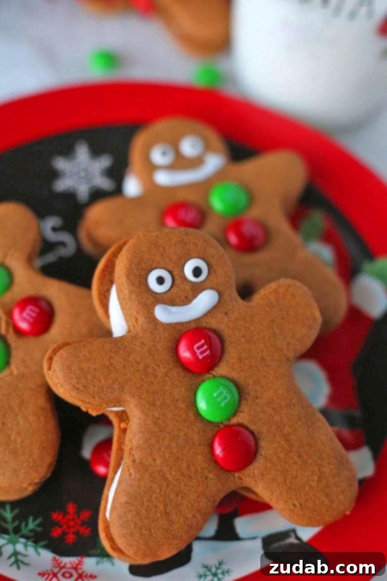 Festive Cookie Collection 4 A plate piled high with delightful Gingerbread Men Cookies, perfectly baked and ready for the holidays.
