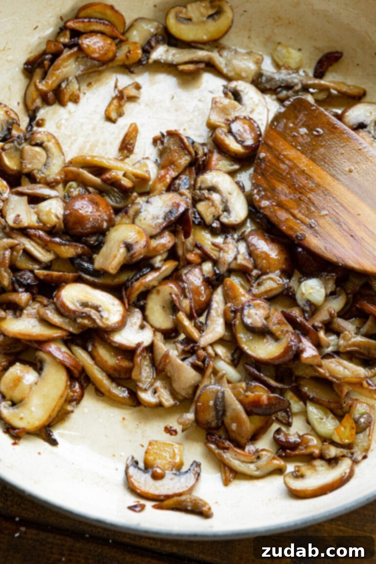 Velvety Creamy Mushroom Pasta 5 a photo of sliced sauteed caramelized mushrooms