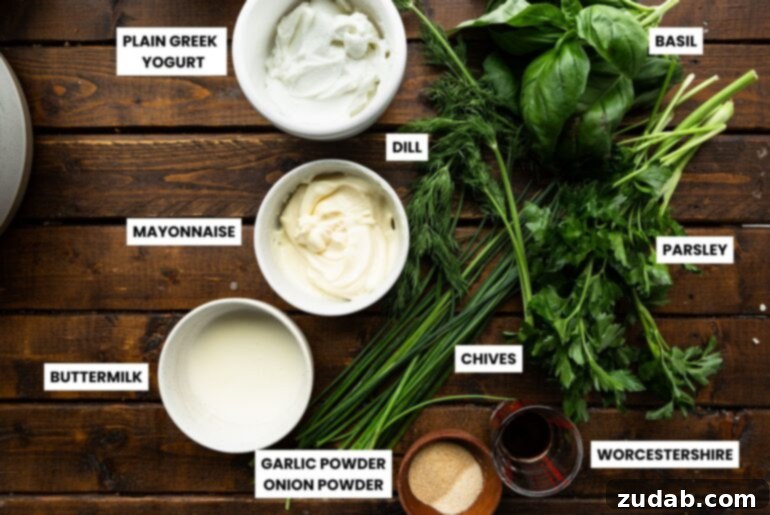 Velvety Basil Dressing Quick And Healthy 4 An array of fresh, vibrant ingredients for creamy basil dressing, including lush basil leaves, bright lemon, and various seasonings, laid out on a clean surface.