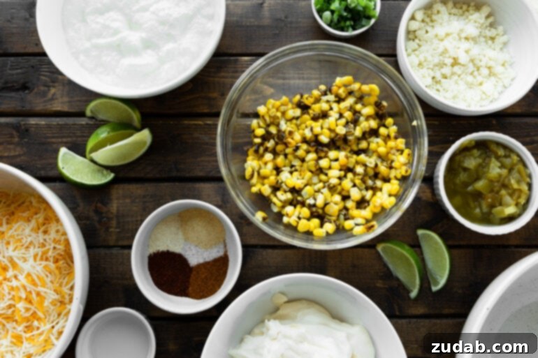 Creamy Slow Cooker Elote Dip 4 a photo of all the ingredients for mexican street corn dip in separate small bowls all sitting next to each other.