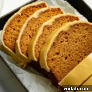 Irresistible Apple Bread with Brown Sugar Glaze 9 Two slices of apple bread with brown sugar icing on top