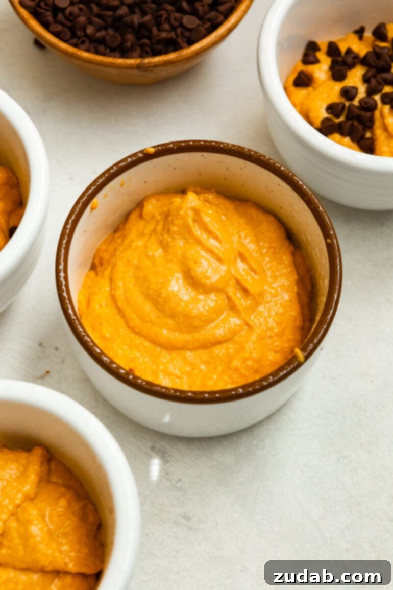 Wholesome Pumpkin Oatmeal Mug Cake 7 A close-up view of the perfectly blended pumpkin mug cake batter, showcasing its smooth, creamy texture before being poured into a mug for baking.