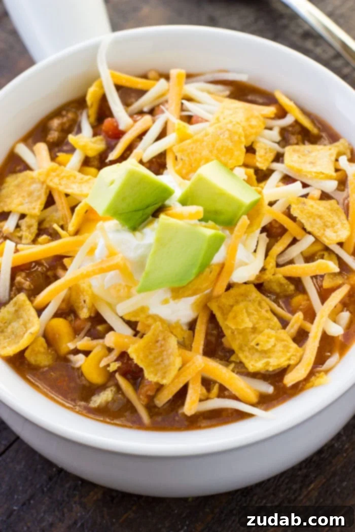 The Best Taco Soup Recipe made in your Instant Pot or Slow Cooker! This quick and easy meal is perfect for busy weeknights. ohsweetbasil.com