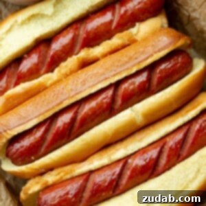 Air Fryer Hot Dogs in buns, a simplified recipe card image.