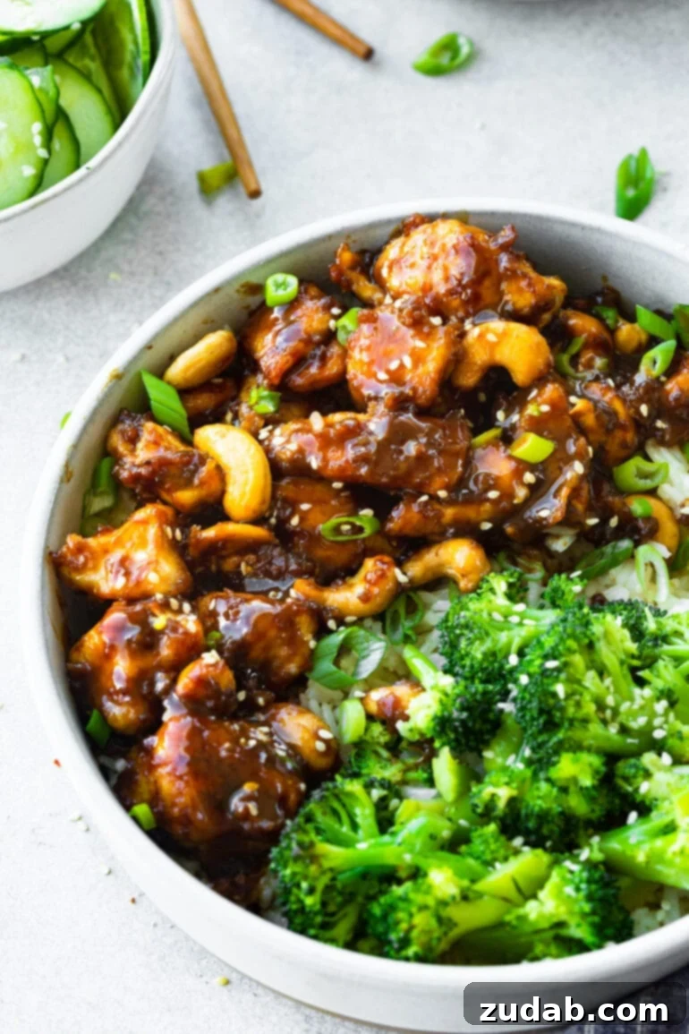 Weekly Meal Plan: March 4-10 4 A vibrant bowl of Easy Cashew Chicken, featuring tender chicken pieces, roasted cashews, and a glossy, savory sauce, served with a side of steamed broccoli.