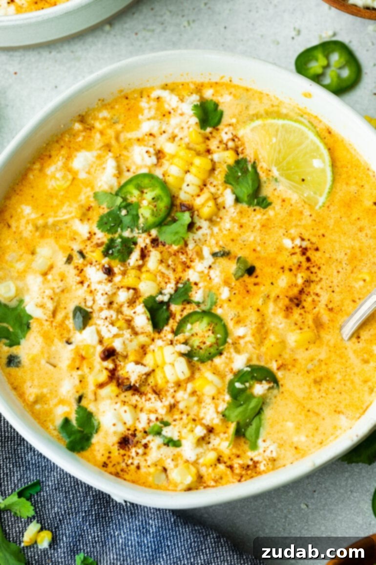 Weekly Meal Plan: March 4-10 5 A large, inviting bowl of Mexican Street Corn Soup, garnished with fresh jalapeño slices, chopped cilantro, lime wedges, and crumbled cotija cheese.