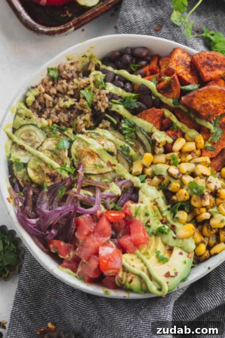 Weekly Meal Plan: March 4-10 6 A vibrant and nutritious vegan Buddha Bowl (burrito bowl) filled with brown rice, quinoa, roasted corn, diced tomatoes, black beans, red onions, zucchini, and sweet potatoes.
