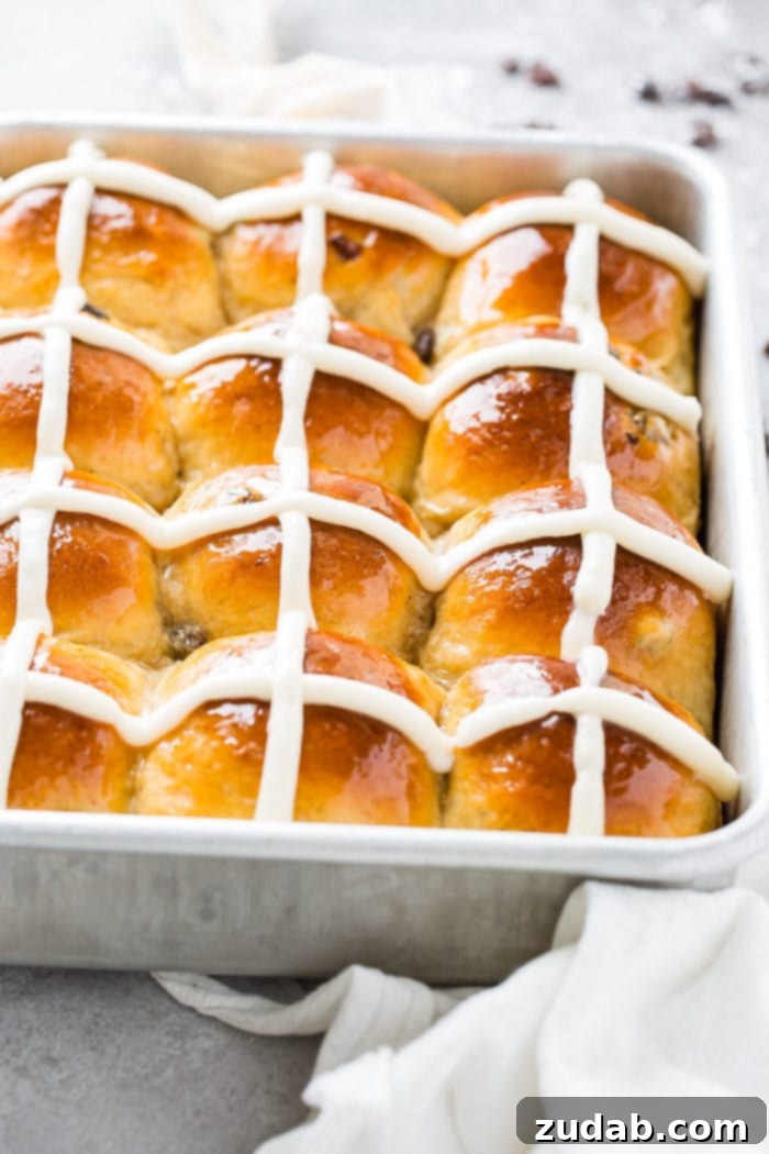 Your Ultimate Easter Sunday Feast 4 A photo of a silver cake pan of hot cross buns.