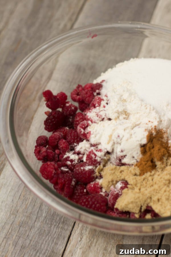 Family Raspberry Pie Old Fashioned Raspberry Pie, a family favorite dessert ready to be shared.