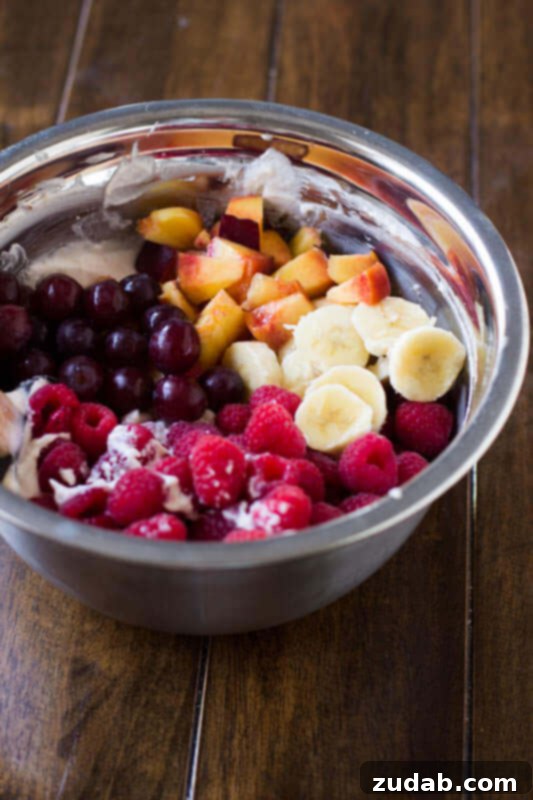 Fluffy Cheesecake Fruit Salad 10 This cheesecake fruit salad is awesome for a side at a potluck or BBQ or even as a dessert! Plus it's so easy it's foolproof! ohsweetbasil.com