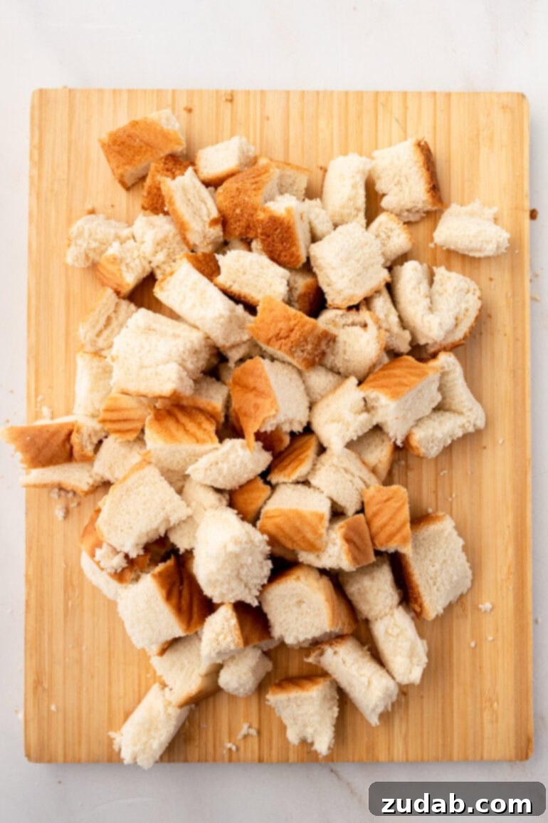 Step-by-step image of whisking wet ingredients for Air Fryer French Toast Muffins