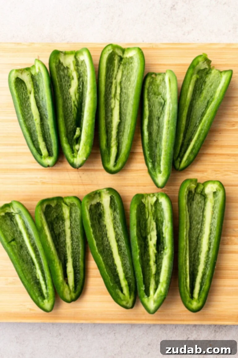 Effortless Air Fryer Jalapeño Poppers 4 Step-by-step image of jalapeño halves ready for filling