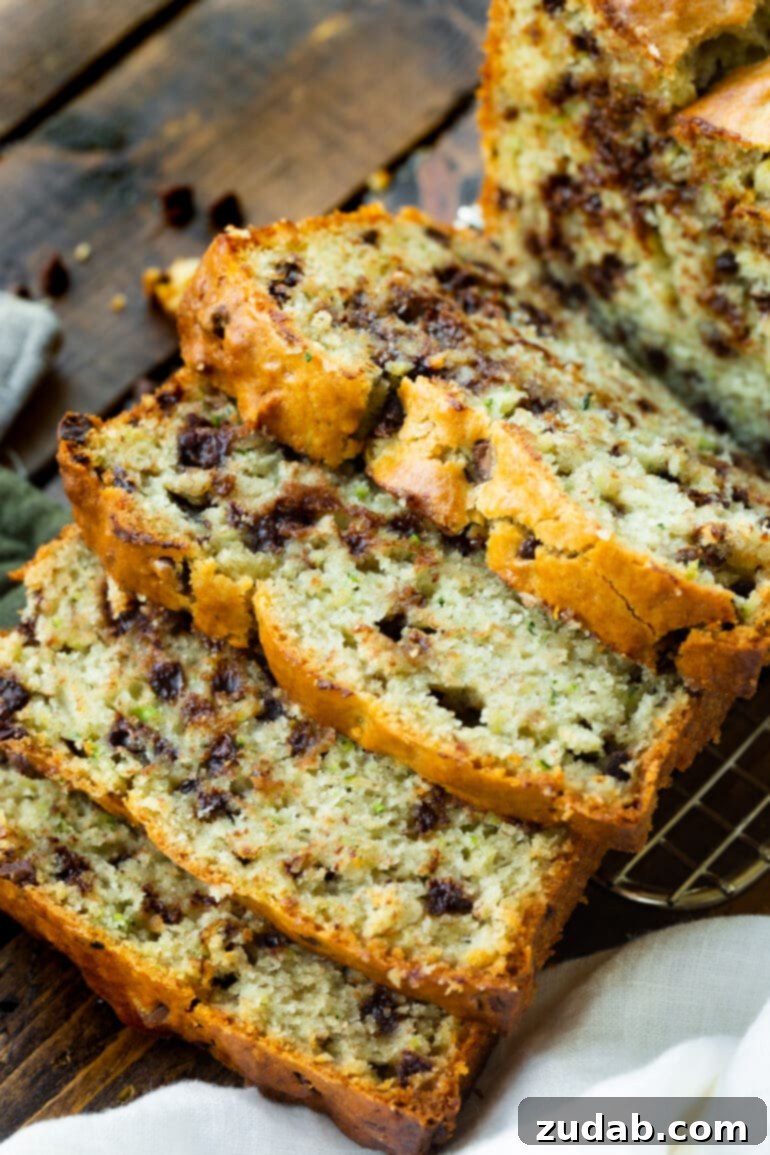 Olympic Celebrations: Red, White, and Blue Recipes 14 a photo of several slices of chocolate chip zucchini banana bread that have tipped over onto each other.
