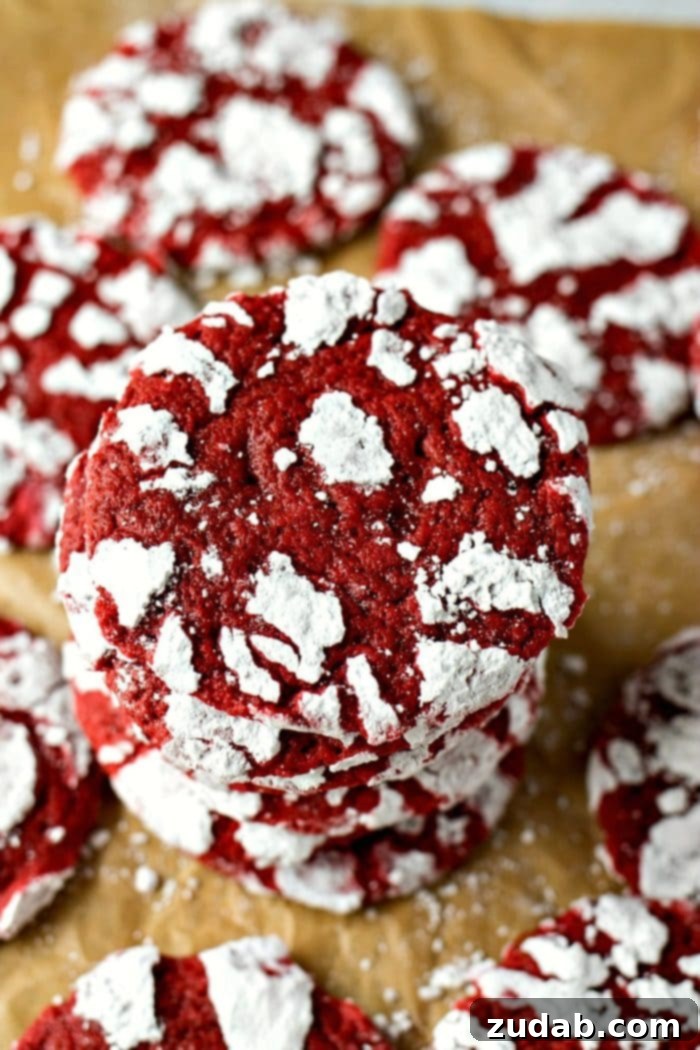 Olympic Celebrations: Red, White, and Blue Recipes 6 Red Velvet Crinkles - Red velvet cookie dough is rolled in powdered sugar before they’re baked into chewy cookies, forming white crinkles on top.