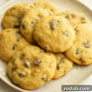 Golden Banana Chocolate Chip Delights 9 A plate full of fluffy banana cookies loaded with chocolate chips