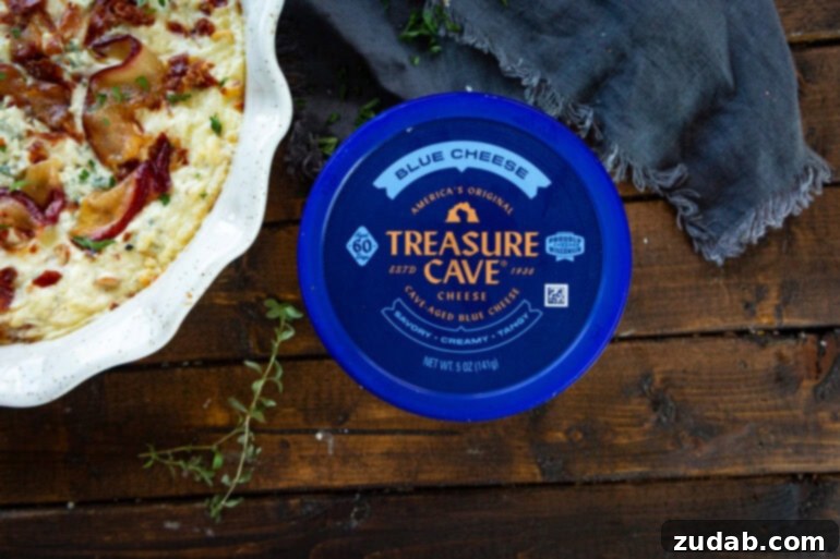 Sweet Pear, Savory Prosciutto & Tangy Blue Cheese Dip 7 A container of Treasure Cave blue cheese sits beside a baking dish of perfectly baked blue cheese dip.
