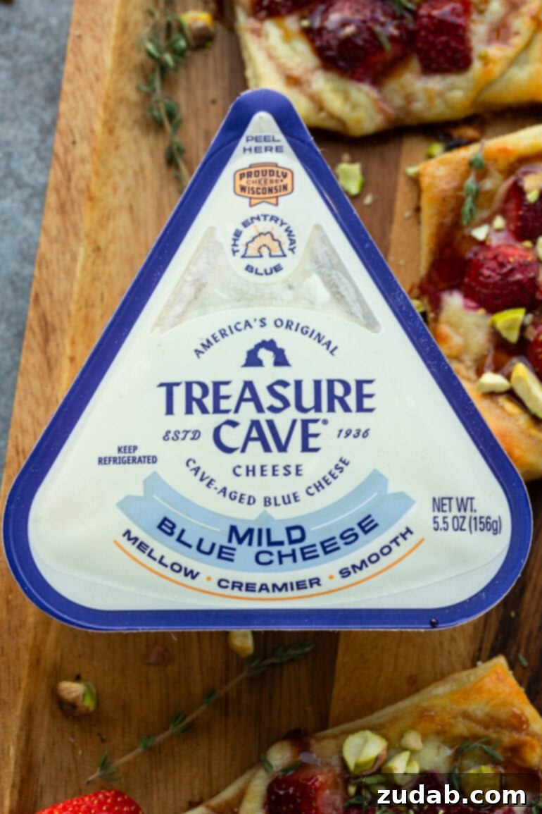 Effortlessly Gourmet Roasted Strawberry Blue Cheese Tarts 4 A vibrant package of Treasure Cave Mild Blue Cheese, the star ingredient for the creamy tart filling.