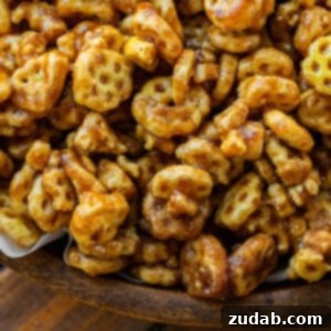 Easy No-Bake Churro Crunch 11 a photo of caramel coated honeycomb cereal tossed in cinnamon sugar