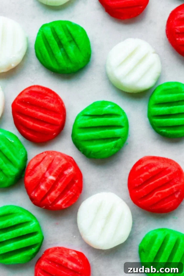 Classic Cream Cheese Mints: A Nostalgic Treat 3 A baking sheet of colorful cream cheese mints pressed with a fork