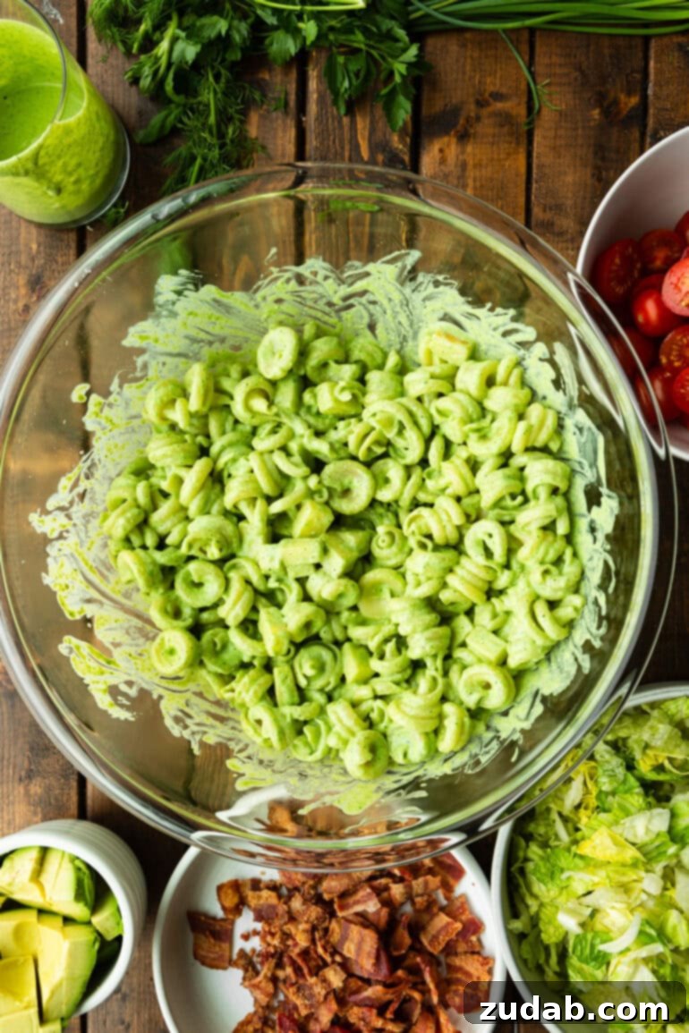 BLT Pasta Perfection 6 Step 2: Cooked pasta being drained, showing its perfect texture for the salad.