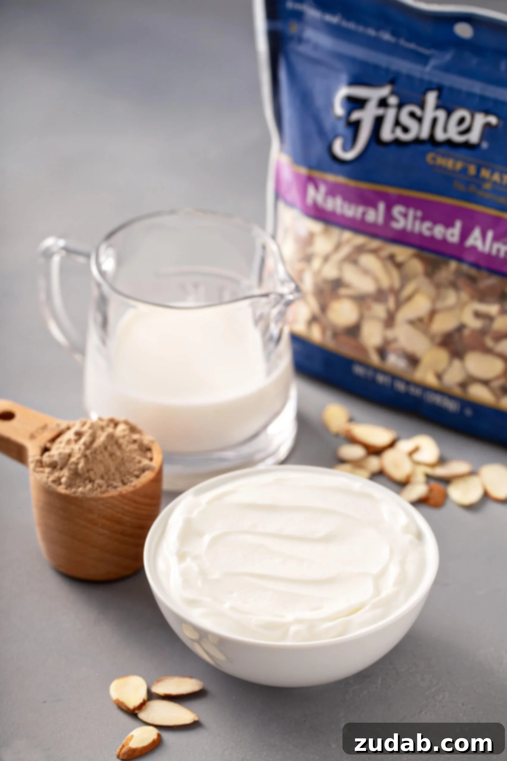 ingredients to make an almond joy protein shake like yogurt, milk, chocolate protein, almonds
