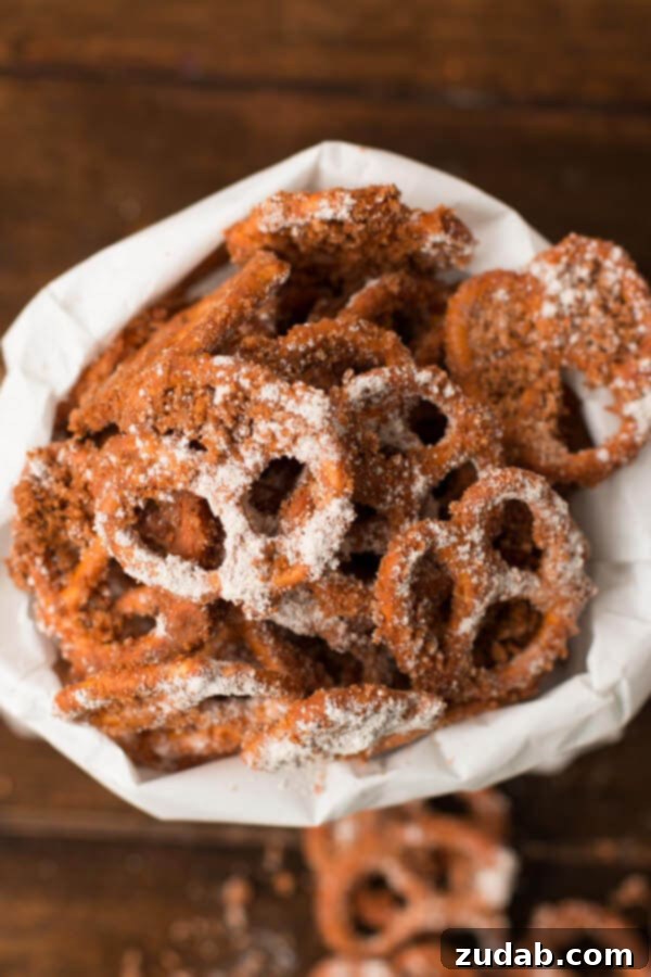 Best Churro Pretzels Ever: A Quick and Easy Sweet Snack Close-up of golden brown Churro Pretzels dusted with cinnamon sugar