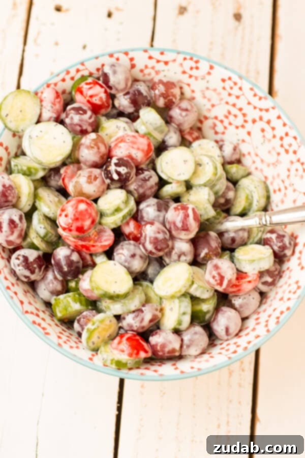 Vibrant Summer Sides 3 cucumber grape salad with strawberry poppy seed dressing! ohsweetbasil.com